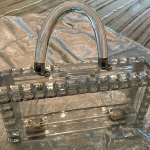 Light weight clear evening bag , square diamond around